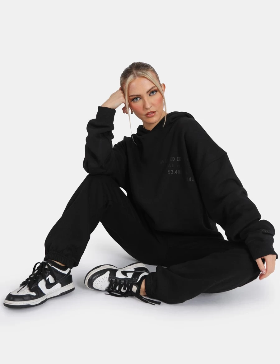 Women's Black Oversized Fit Printed Joggers by Public Desire